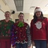 Students pose for a picture in their holiday apparel for Ugly Holiday Sweater Day.
